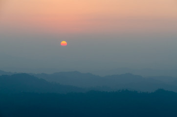 Mountain field during sunset. Beautiful natural landscape, Kanchanaburi, Thailand