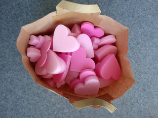 Mix of Pink 3D Heart Shapes in Various Sizes in a Paper Bag