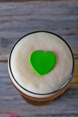 Love beer. Beer glass with green heart