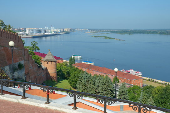 Beautiful view of Nizhnevolzhskaya embankment and the Arrow - the confluence of the Oka and Volga rivers from the observation deck of Chkalovskaya stairs in Nizhny Novgorod, Russia