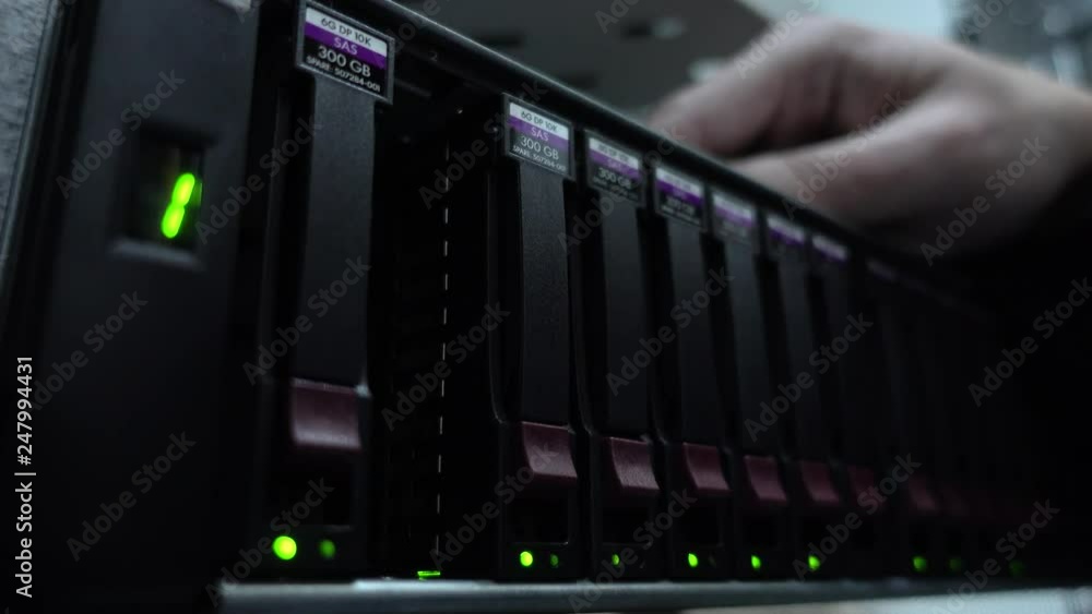 Poster engineer working in a data center. hard drive insert. concept 3.0
