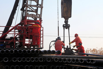 oil workers are in the drilling area