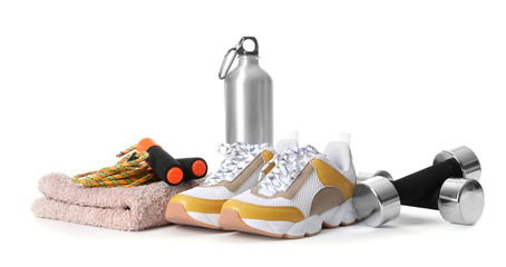 Composition with fitness gym equipment on white background