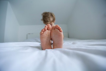 Five years old child sleeping with hat comfortably