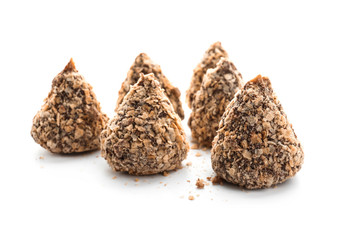 Tasty sweet truffles on white background