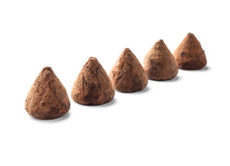 Tasty sweet truffles on white background