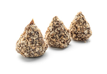 Tasty sweet truffles on white background