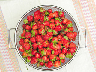 Fresh Strawberries background. Strawberry. Food background.Copy space. Top view, healthy food for breakfast. Eco, organic summer diet food. Ripe strawberries from garden.Summer strawberry.
