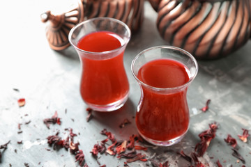 Glasses of tasty Turkish tea on table