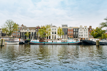 Fototapeta na wymiar Amsterdam, Netherlands September 5, 2017: canals and rivers. City landscape. Tourist place. Sights.