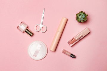 Set of makeup cosmetics with accessories on color background