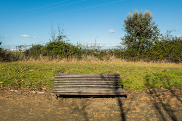 A bench a little dilapidated in a park in a suburb of Caceres, Extremadura, Spain.