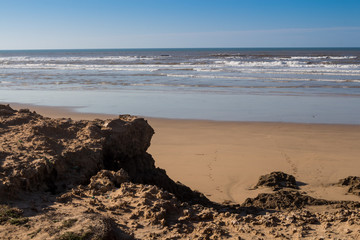 Sand and rocks on the beach, Morocco