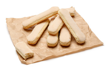 Fototapeta na wymiar Traditional Italian Savoiardi ladyfingers Biscuits on craft paper