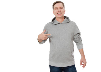 Man pointing copy space on template mens hoodie sweatshirt long sleeve isolated on white background. Man in blank sweatshirt hoody with mockup for design logo print, Front view. Middle age man