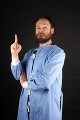 Scientist is holding is finger up giving of advice or theory