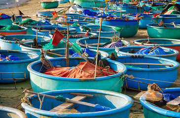 Fototapeta na wymiar Vietnamese fishing boats on the sandy beach. Asia, Vietnam, Mui Ne, Phan Thiet.
