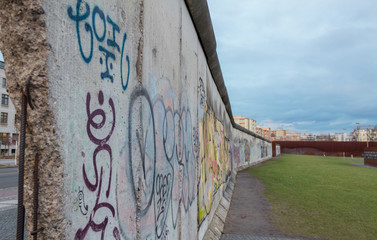 part of the berlin wall close up graffiti