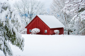 Red snow covered barn, Stowe, Vermont, USA