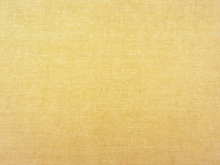 Fototapeta na wymiar Soft textile fragment, light yellow eye-relaxing background