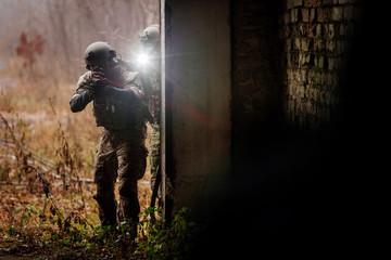 rangers during the military operation with laser sights and lanterns.