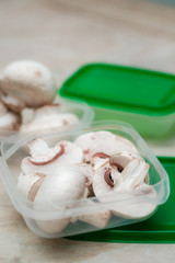 close up conception of vegetarian and healthy food in lunch green boxes in fridge with soft ligth