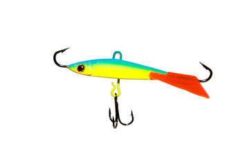 Winter bait balancer for predatory fish. Bright yellow with green balancer. With red fin. On white background. Isolated.