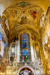 Fototapeta na wymiar Mary Stained Glass Frescoes Santa Maria Novella Church Florence Italy