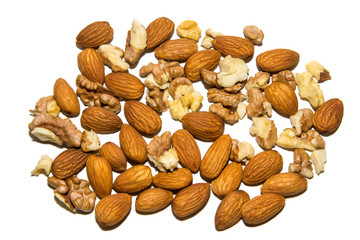 Close-up of walnut and almond. Fruits of walnuts and almonds. On white background. Isolated.