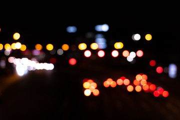 Abstract blurred background of city light. Out of focus traffic light background.