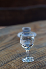 a сup of black coffee and a glass of clean water