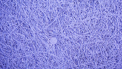 Texture of weaving on the paper ceiling in lilac-blue tones. Basement, construction