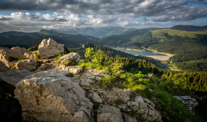 Fototapeta na wymiar Bolboci lake inside Bucegi mountains , Romania Carpathian mountains