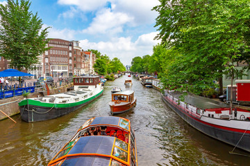 Idyllic Amsterdam with cannel and boats