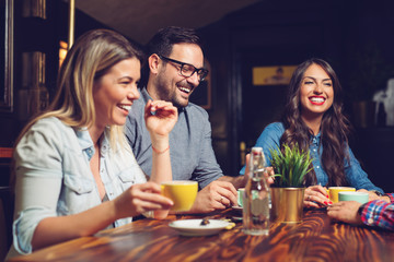 Old friends catching up, having coffee.