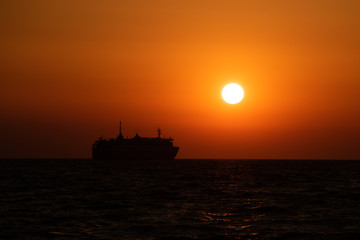 Ferry boat in Greece at sunset in summer time , Travel to Greece 