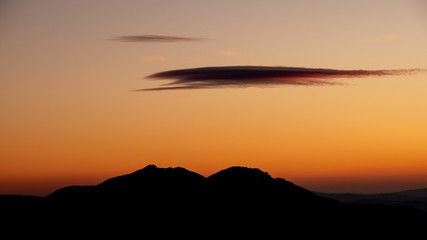 Silhouette of the mountains at dusk , Rarau mountains in Bucovina , Romania 