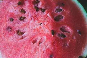 Juicy watermelon lying on the table. Summer fruit. Vegetarian healthy raw diet.