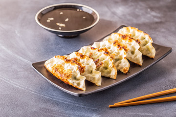 gyoza or dumplings snack with soy sauce
