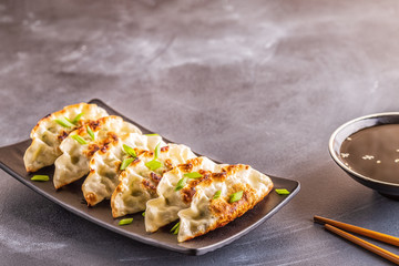 gyoza or dumplings snack with soy sauce
