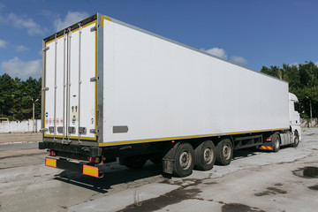 white truck with trailer