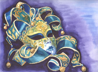 Venetian mask with golden patterns and bells, for masquerades, lies on a purple background
