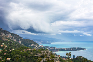 View from La Turbie to Monaco, Cape Martin and Italy, stormy clouds and rain in Italy, La Turbie, France