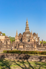 Fototapeta na wymiar stupas and Prang towers in Wat Mahathat in the Historical Park of Sukhothai, Thailand, Asia