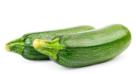 Two ripe zucchini close-up on a white background.