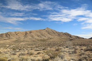 Fototapeta na wymiar Rock cliffs on the desert landscape