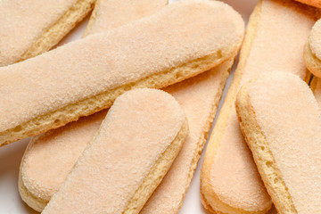 Traditional Italian Savoiardi ladyfingers Biscuits on White Background