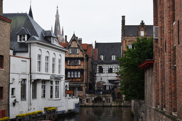 Fototapeta premium Brugge attractions. The old town hall of Bruges. Brugge streets and historic center. canals and buildings.