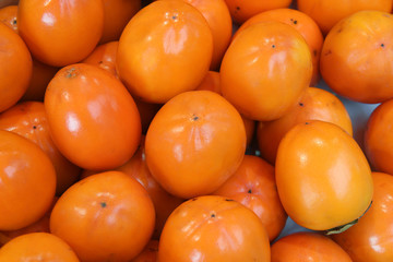 pile of fresh persimmons
