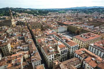 Obraz premium Tower of palazzo vecchio in florence top view to roofs old town